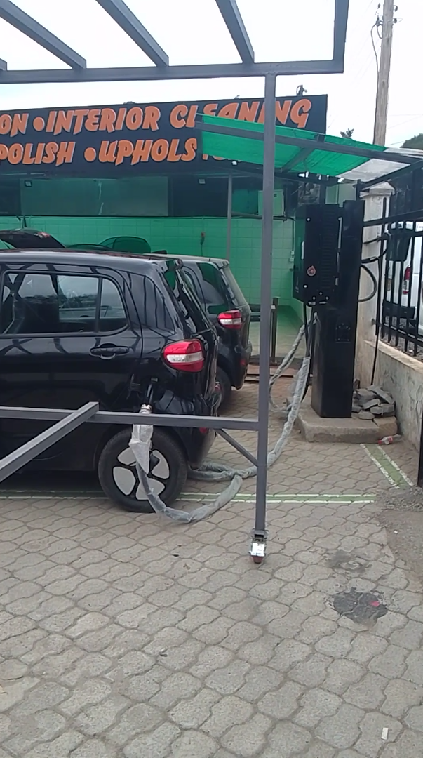 Electric cars plugged in at the Joe Wa EV charging bay on Magadi Road
